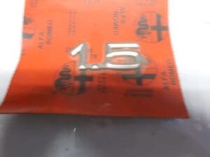 60515258 SIGLA MODELLO ALFA 33 E ALFA 33 I.E. NUOVO ORIGINALE