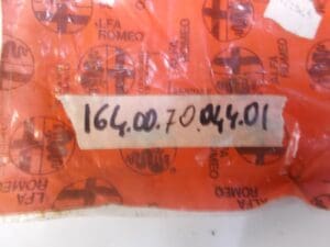 164007004401 COPERCHIO CONSOLE CENTRALE POSTERIORE ALFA 164 NUOVO ORIGINALE - immagine 3