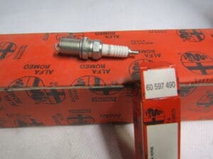 60597490 CANDELA ACCENSIONE ALFA 155 NUOVO ORIGINALE