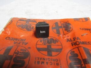 162004404300 INTERRUTTORE RESET CONTA KM DIGITALE ALFA 90 NUOVO ORIGINALE