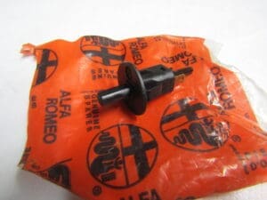 60555433  INTERRUTTORE LUCE PORTA OGGETTI  ALFA  147 156 164 166 GT NUOVO ORIGINALE