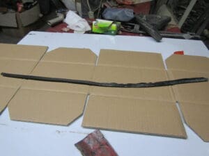 60589580 PROFILATO PASSARUOTA ANTERIORE ALFA 155 NUOVO ORIGINALE