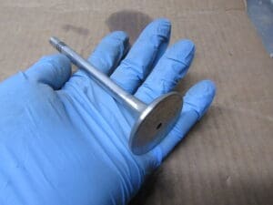 60512751 VALVOLA DI SCARICO ALFA 75 155 164 NUOVO ORIGINALE