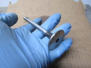 60504784 VALVOLA SCARICO ALFA 33 1.3/1.5 NUOVO ORIGINALE