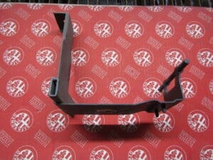 60627014 LAMIERATO STAFFA  BATTERIA ALFA 164 NUOVO ORIGINALE