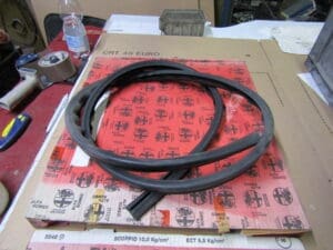 60627217 GUARNIZIONE  SX GOCCIOLATOIO ALFA 145 NUOVO ORIGINALE