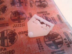 60806240 MOLLETTA RIVESTIMENTI INTERNI ALFA 145 146 NUOVO ORIGINALE
