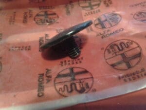 60586030 VITE FINESTRA LATERALE ALFA 145 NUOVO ORIGINALE