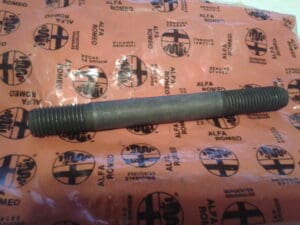 60507284 PRIGIONIERO L=113 BASAMENTO ALFA  RZ SZ  75 147 155 156 164 GTV  SPIDER NUOVO ORIGINALE