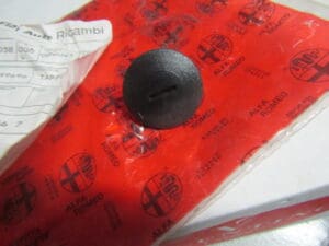60549696 TAPPO   PARAURTI POSTERIORE ALFA 164 NUOVO ORIGINALE